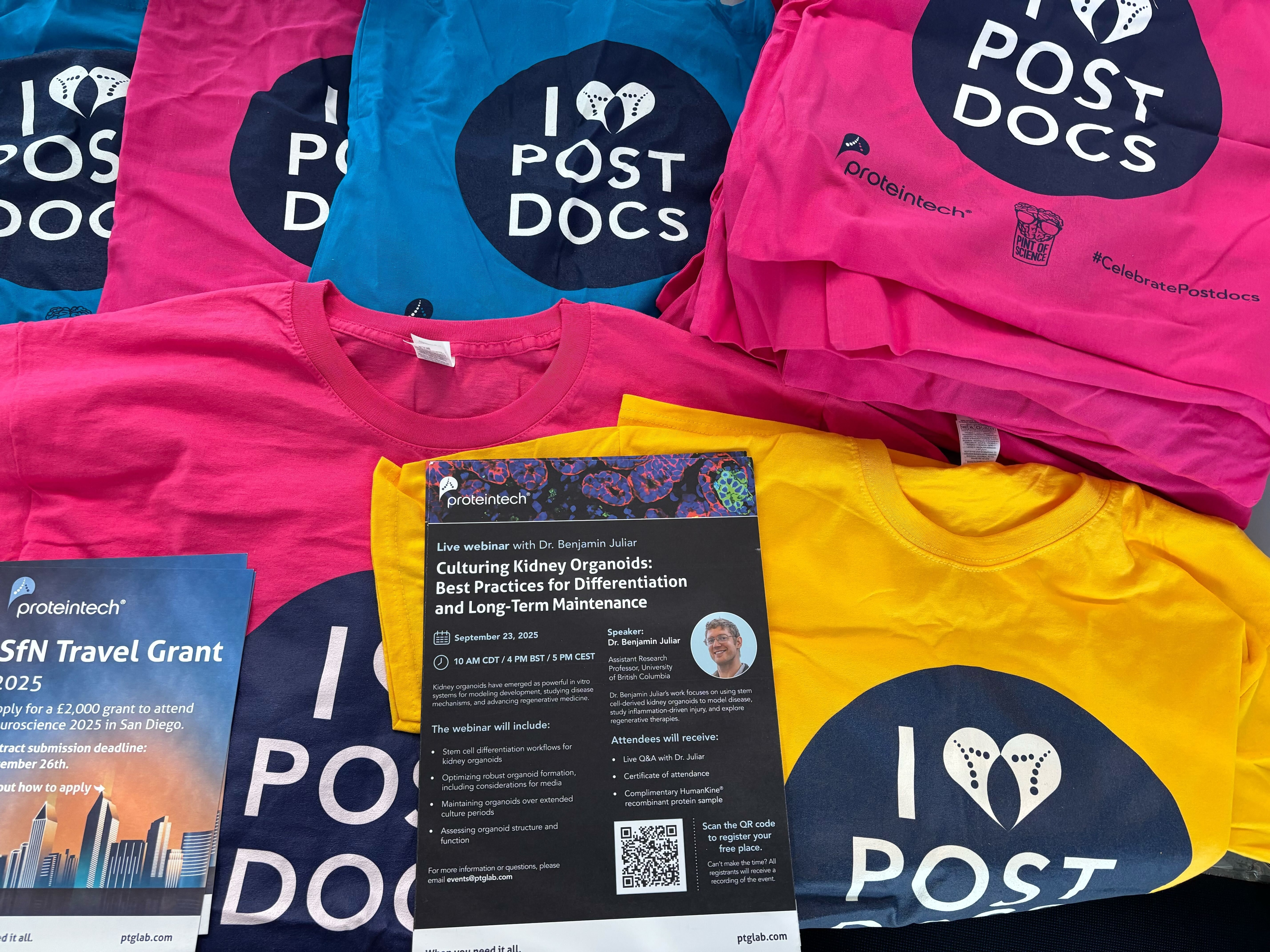 Colourful Proteintech Postdoc Appreciation Week T-shirts and promotional materials